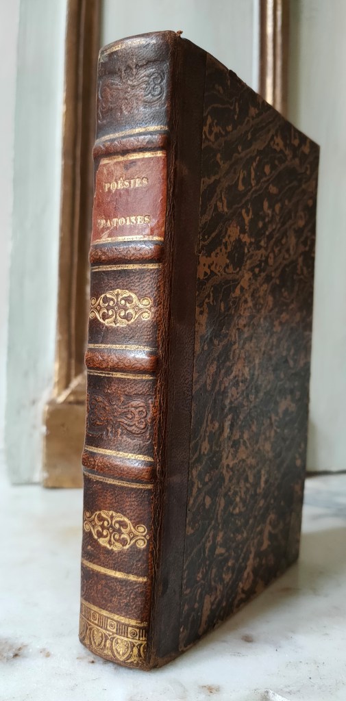 Jean Foucaud Patois limousin : livre publié en 1849 avec une reliure demi basane de l'époque